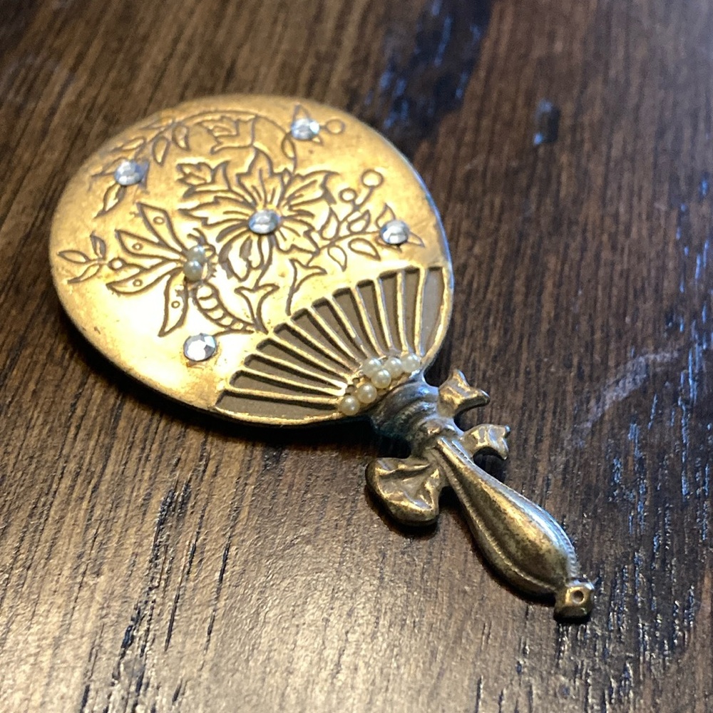 Signed Gold Tone Fancy Floral Engraved Hand Mirror Brooch